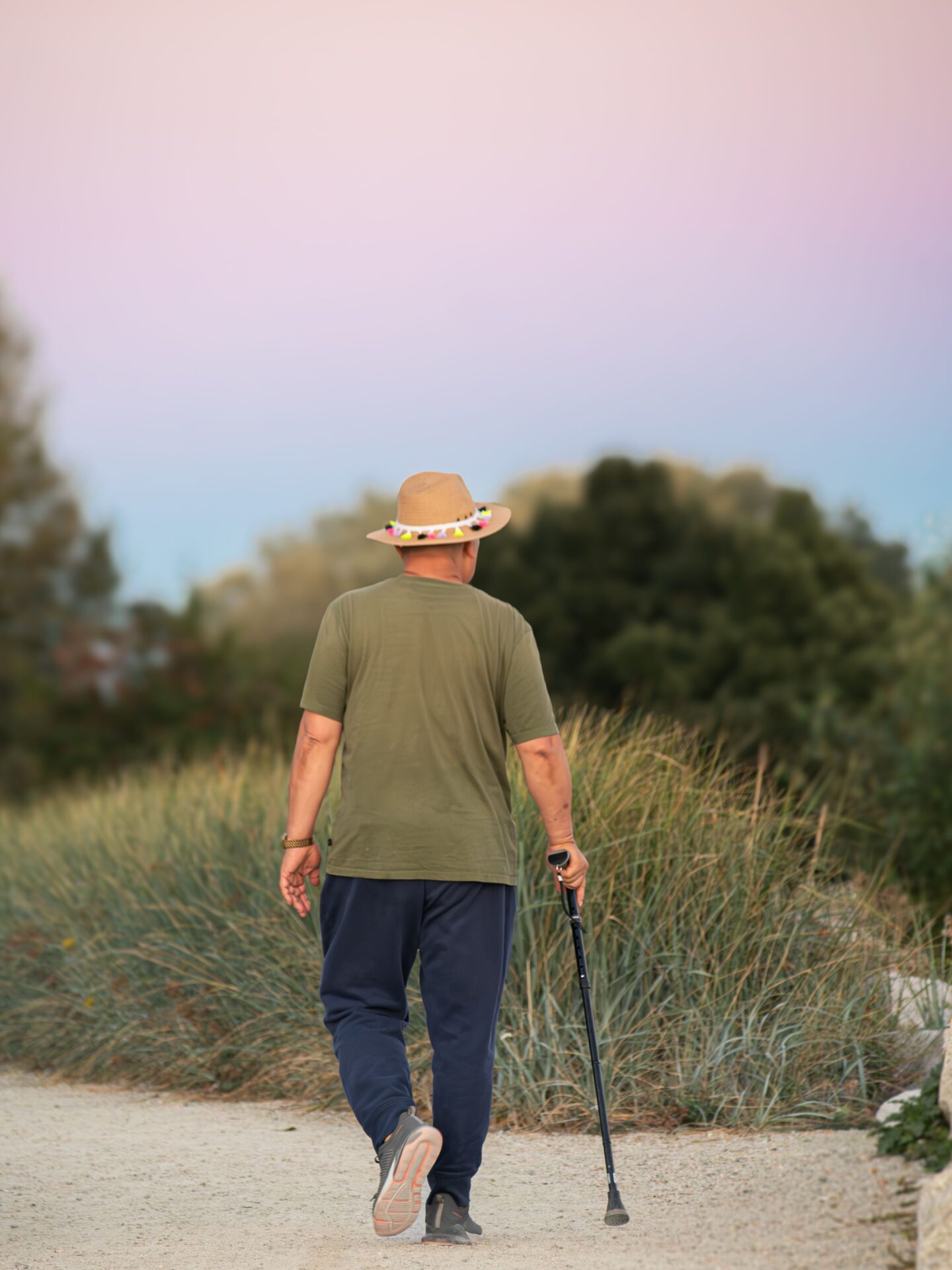 person walking with a cane
