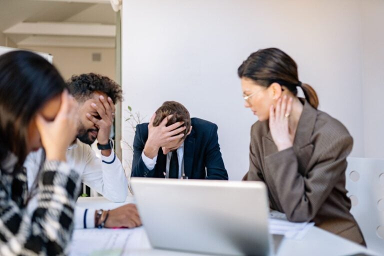 a group of people stressed at work